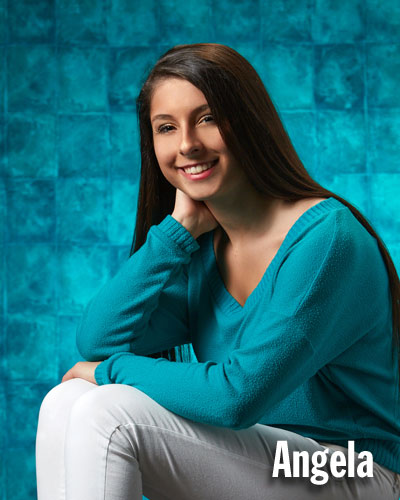Studio One senior photo of girl on blue tile